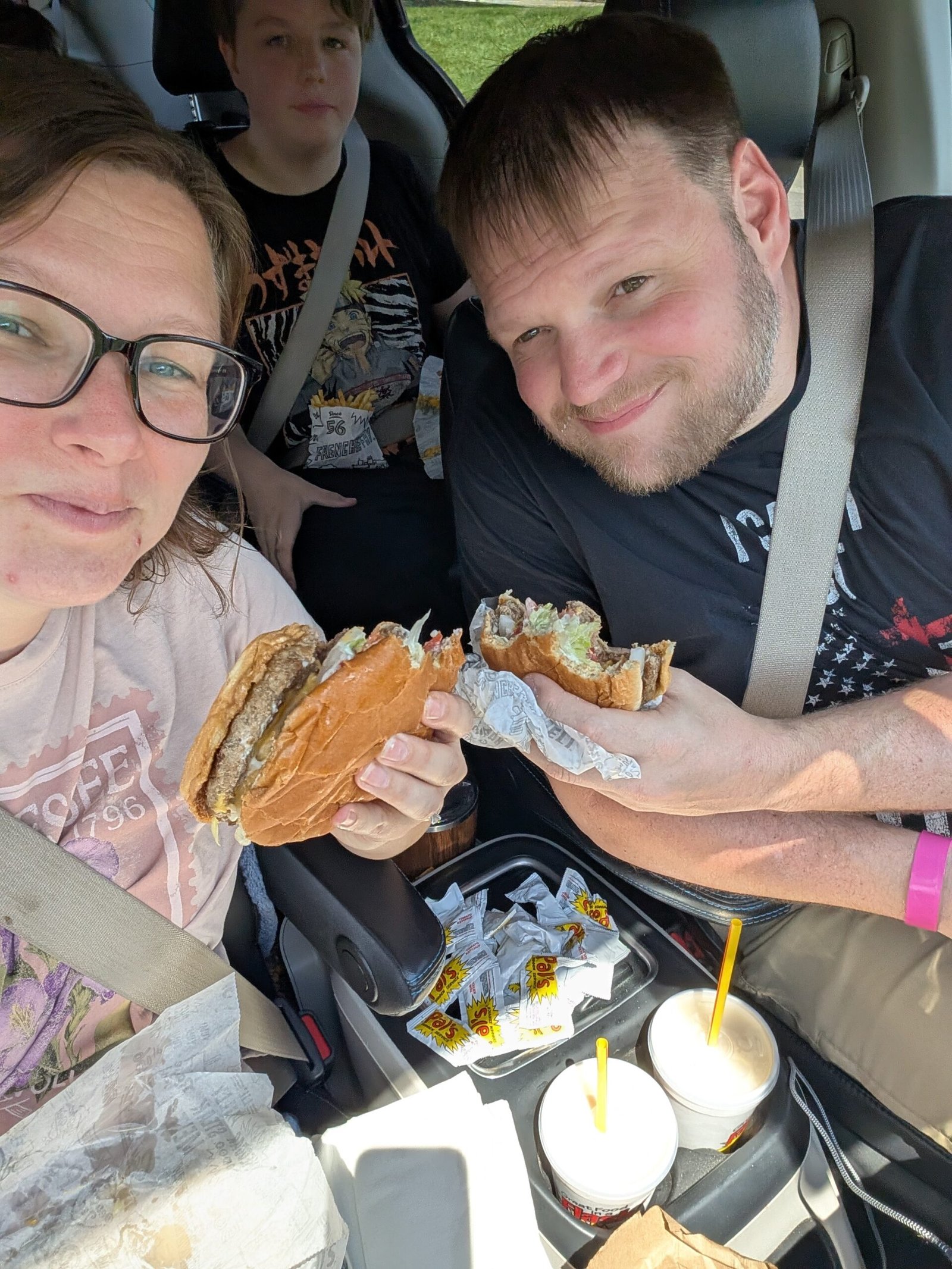 Ketchup Packets and God's Gentle "Not Yet": A Tennessee Memory That Found Its Way Back to Our Dinner Table The family eating Pals in the van during the Tennessee trip, with ketchup packets visible – the same ones used for last night