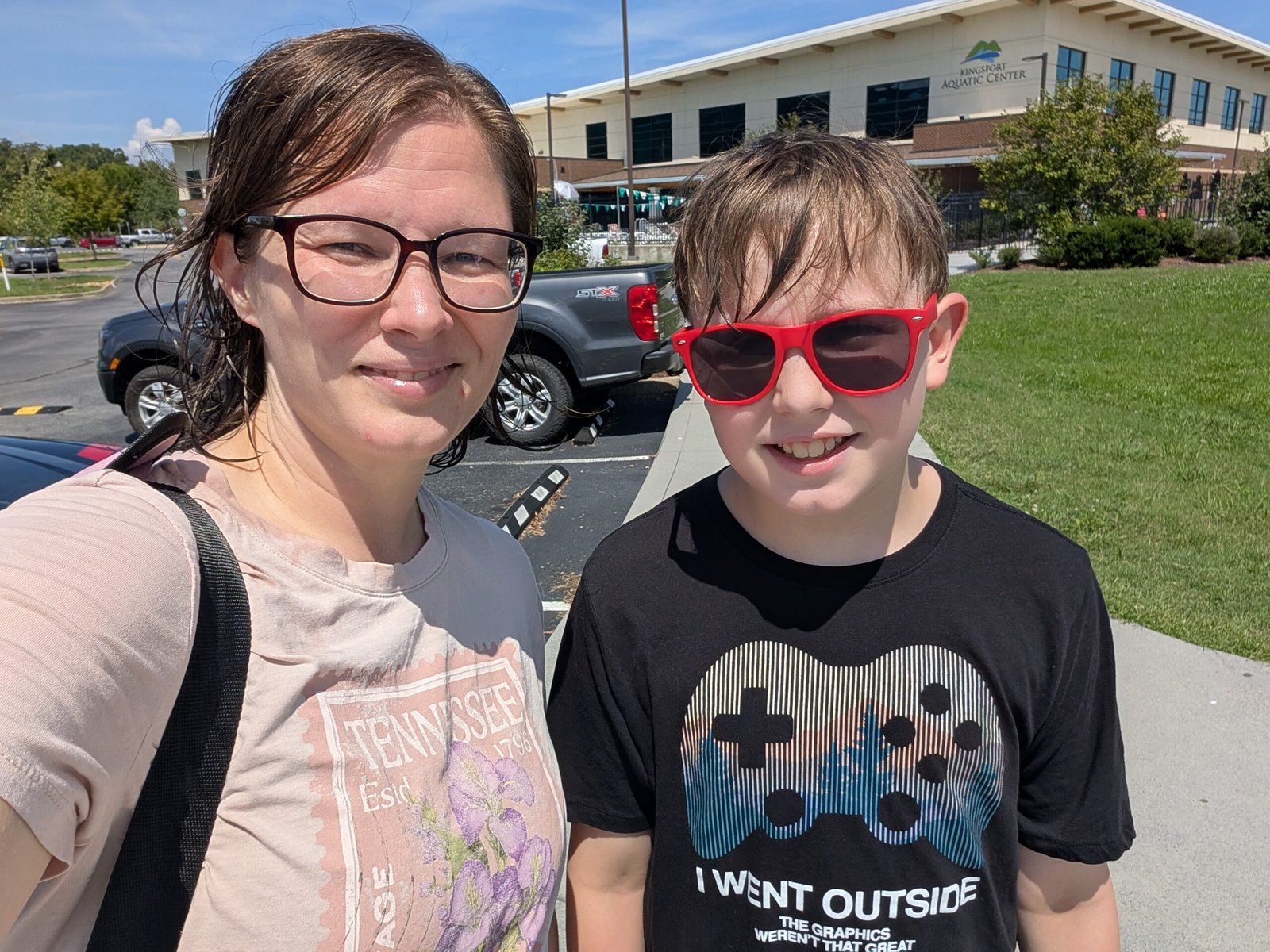 Ketchup Packets and God's Gentle "Not Yet": A Tennessee Memory That Found Its Way Back to Our Dinner Table Jenn and Nathan standing in front of the Kingsport Aquatic Center, smiling during their Tennessee scouting trip.