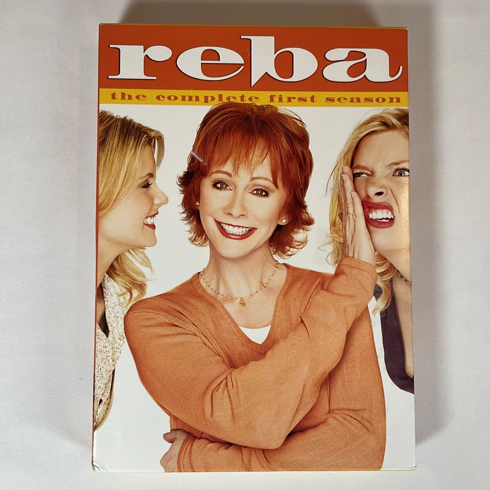 Screen Time with Soul: Episode 1 – Reba on Hulu Reba McEntire as Reba Hart in the Hulu sitcom Reba, smiling warmly with her family.